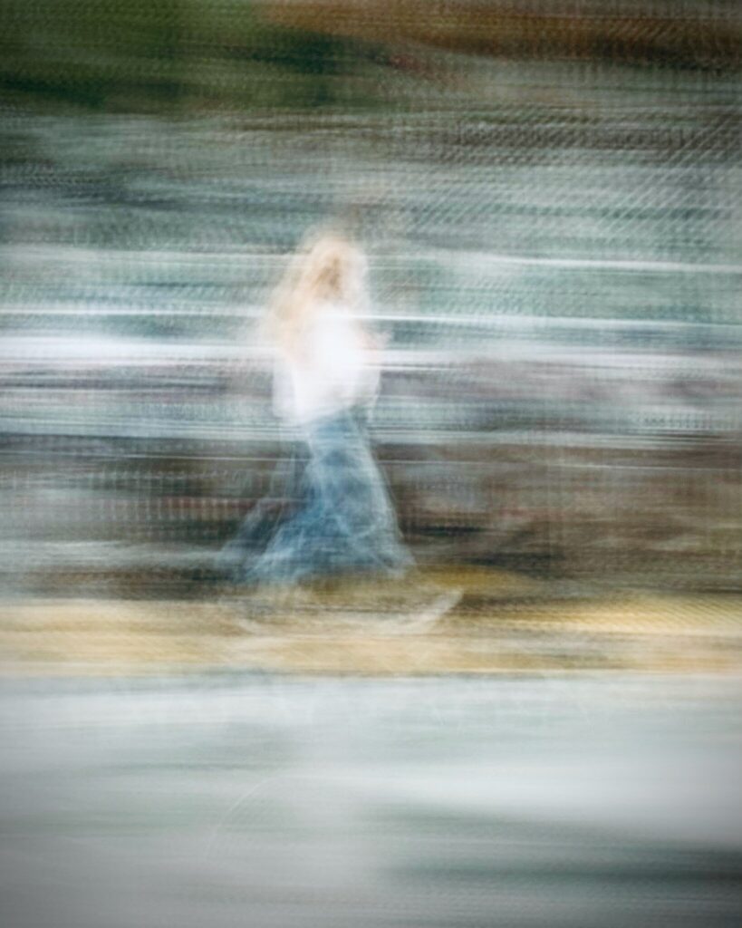 Person walking in an ICM photo by Tony Gunn