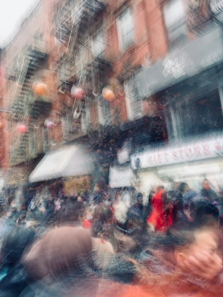 Lunar New Year in the streets of Chinatown, New York City captured by Tony Guinn using ICM photography
